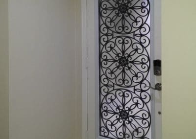 Eclipse wrought iron design by What A Pane