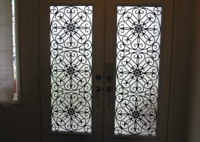 Eclipse wrought iron design by What A Pane