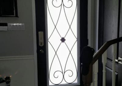 Wrought Iron door insert by What A Pane