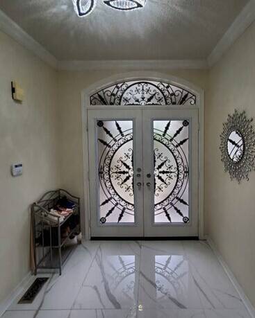 Tranquility wrought iron door insert, installed (photo 12)