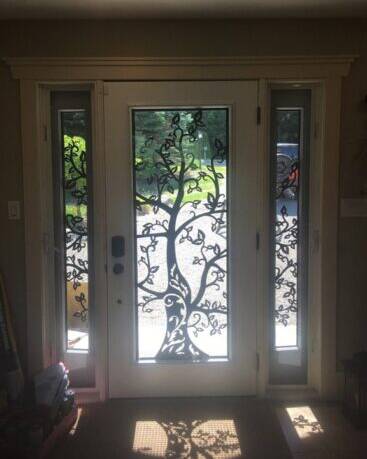 Woodland laser cut iron door insert, installed (photo 7)