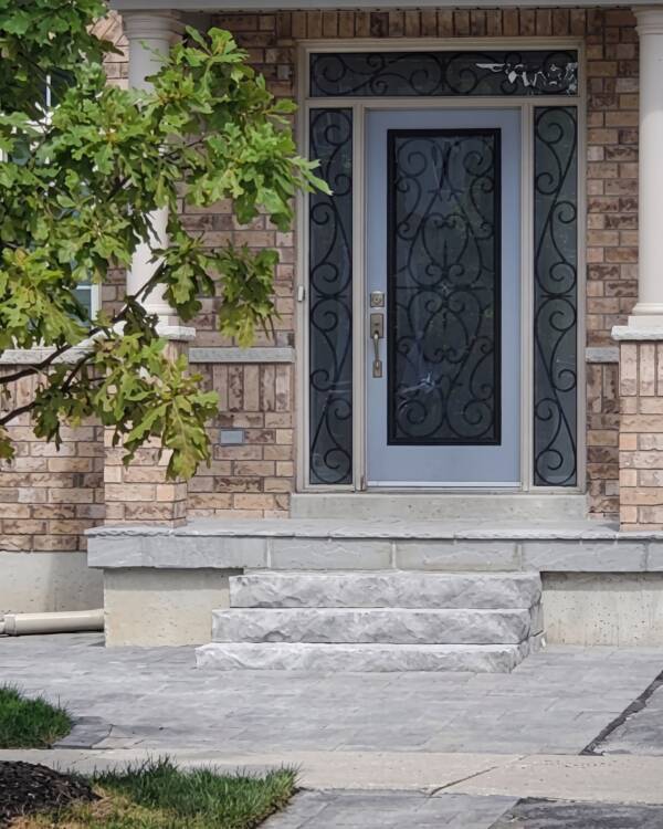 A Bristol wrought iron insert in a front door