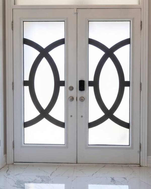 Oracle laser cut iron inserts in a double door