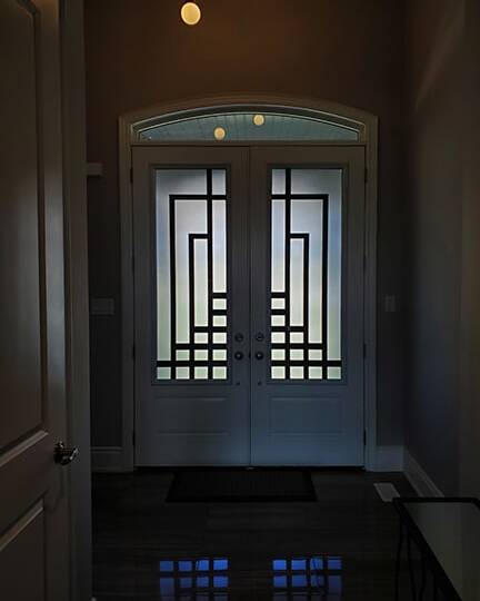 Absolute laser cut iron door insert, installed (photo 3)