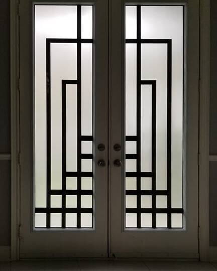 Absolute laser cut iron door insert, installed (photo 4)