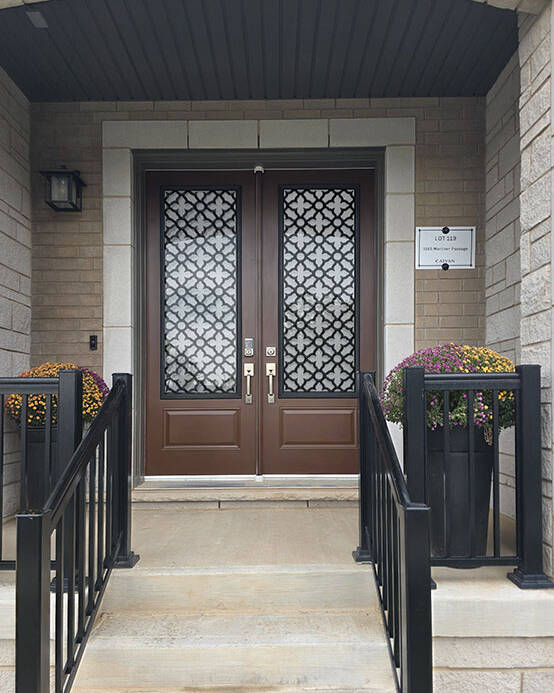 Palisade laser cut iron door insert, installed (photo 9)