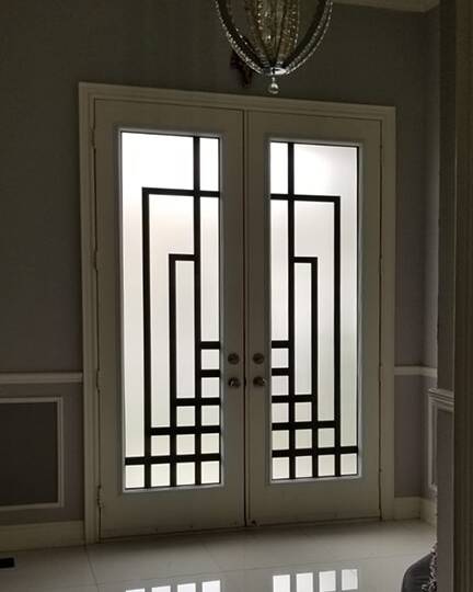 Absolute laser cut iron door insert, installed (photo 5)
