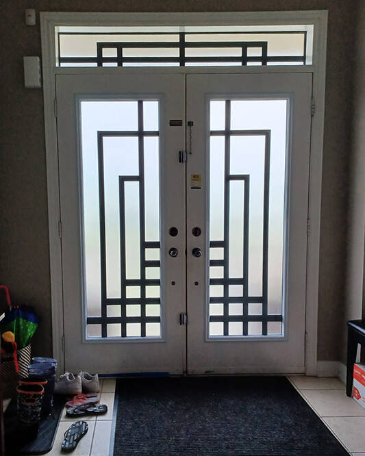 Absolute laser cut iron door insert, installed (photo 7)