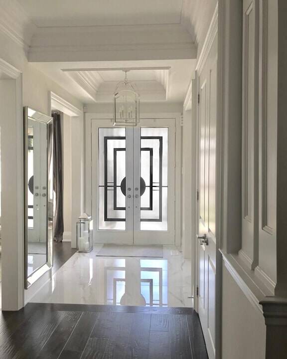 Constellation wrought iron inserts in a double front door