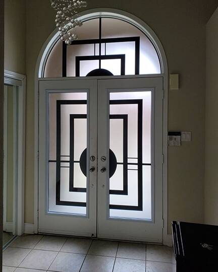 Constellation wrought iron door insert, installed (photo 16)