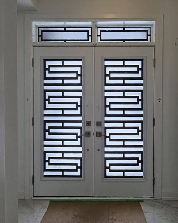 Defender laser cut iron door insert, installed (photo 6)