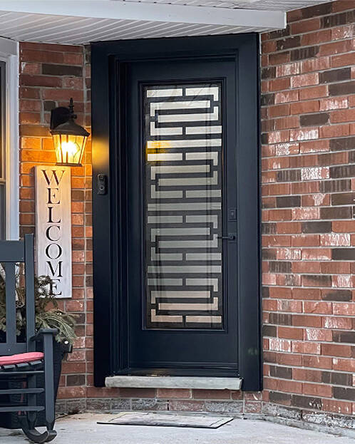 Defender laser cut iron door insert, installed (photo 8)
