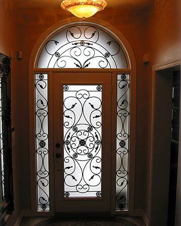 Destiny wrought iron door insert, installed (photo 2)