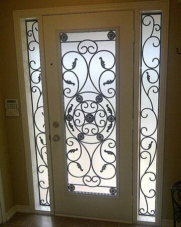 Destiny wrought iron door insert, installed (photo 3)