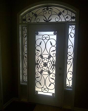 Destiny wrought iron door insert, installed (photo 4)