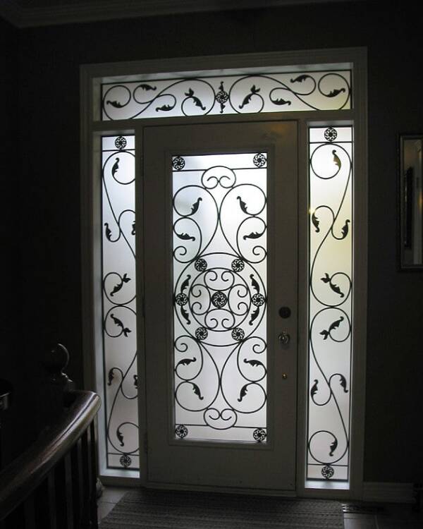 Destiny wrought iron door insert, installed (photo 11)