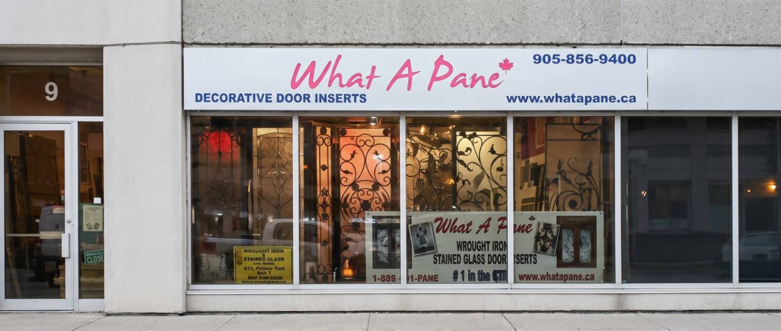 The What A Pane showroom, lit at night