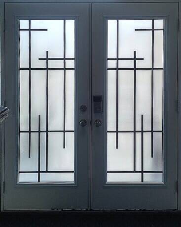 Enigma wrought iron door insert, installed (photo 5)