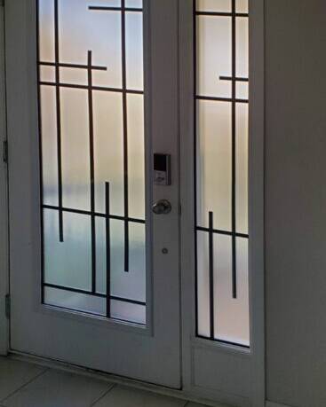 Enigma wrought iron door insert, installed (photo 7)