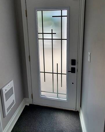 Enigma wrought iron door insert, installed (photo 14)