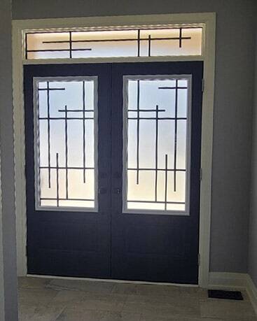 Enigma wrought iron door insert, installed (photo 15)
