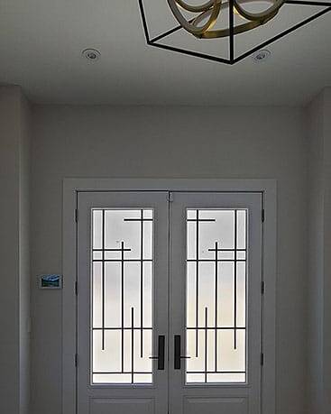 Enigma wrought iron door insert, installed (photo 16)