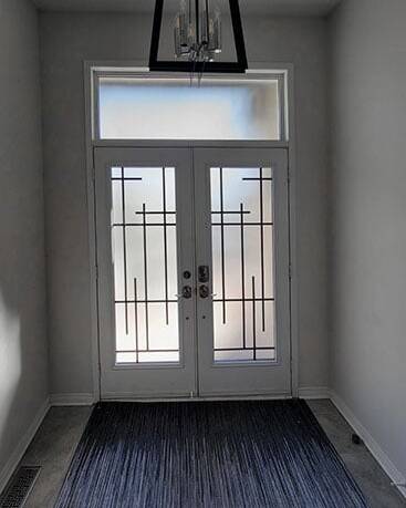 Enigma wrought iron door insert, installed (photo 17)