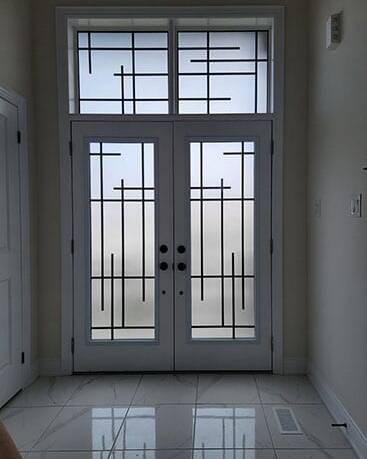 Enigma wrought iron door insert, installed (photo 18)