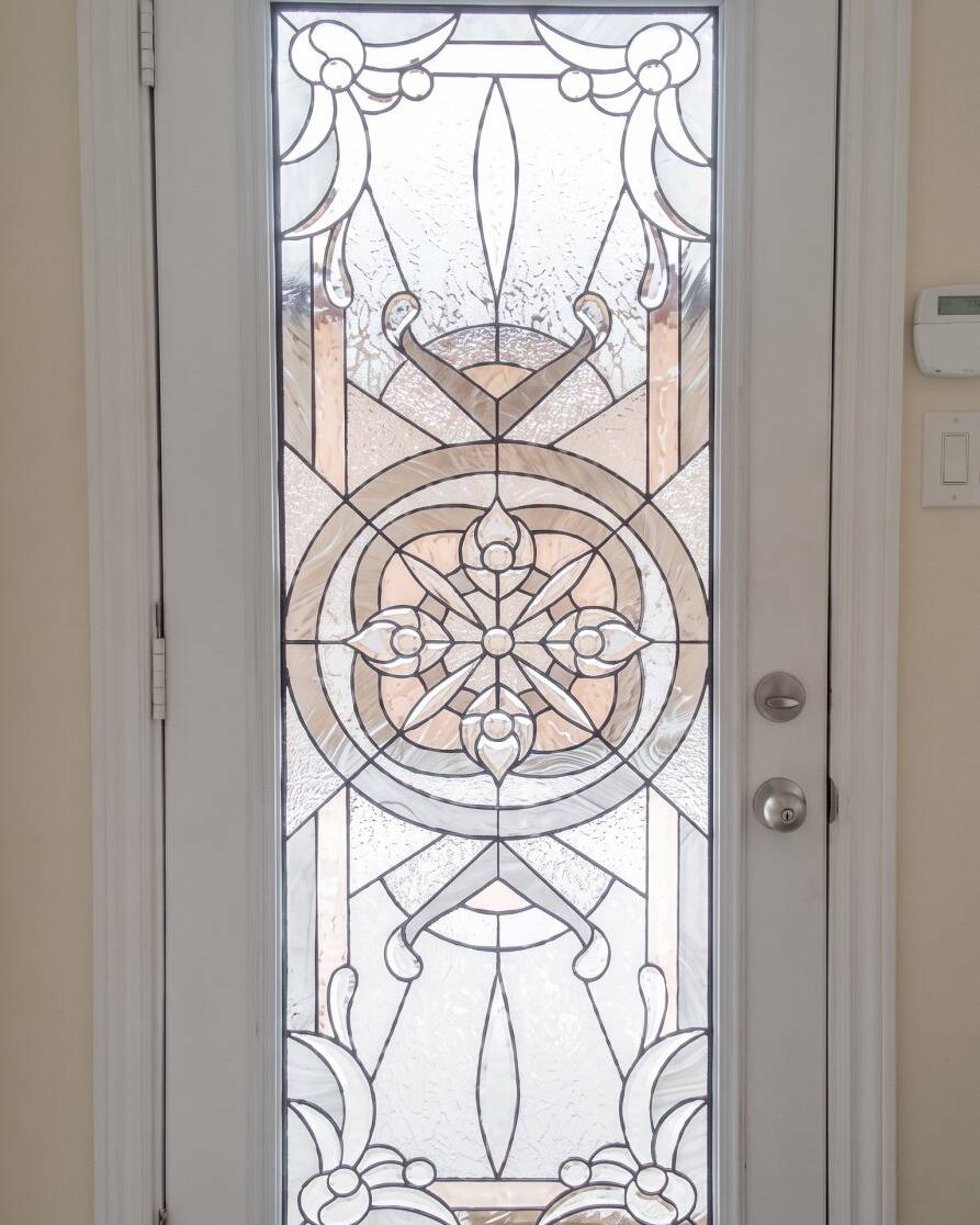 Eternity stained glass inserts in a double front door
