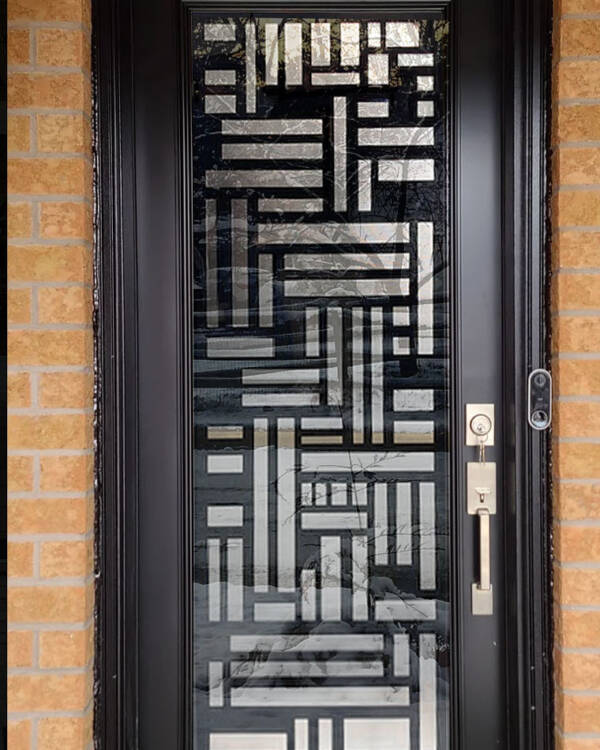 Fortress laser cut iron door insert, installed (photo 2)
