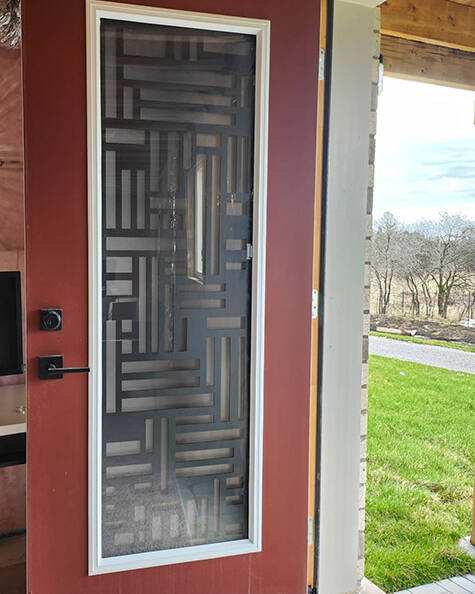 Fortress laser cut iron door insert, installed (photo 6)