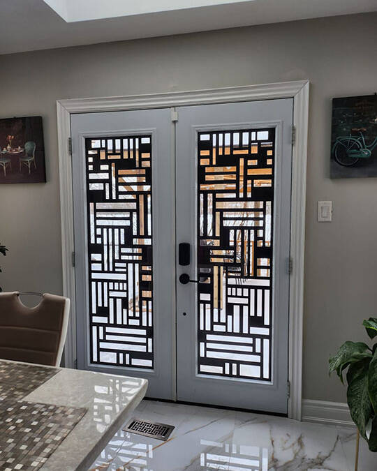 Fortress laser cut iron door insert, installed (photo 7)