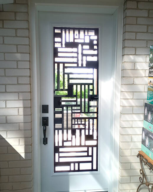 Fortress laser cut iron door insert, installed (photo 12)