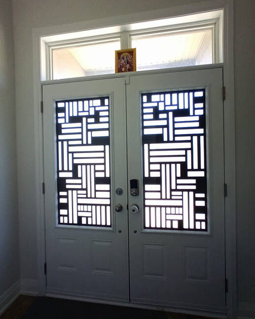 Fortress laser cut iron door insert, installed (photo 13)