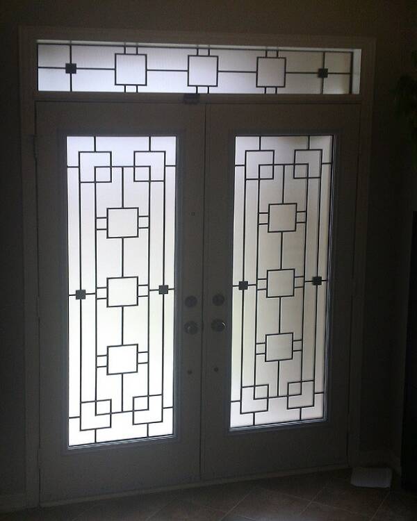 Artisan wrought iron door insert, installed (photo 8)