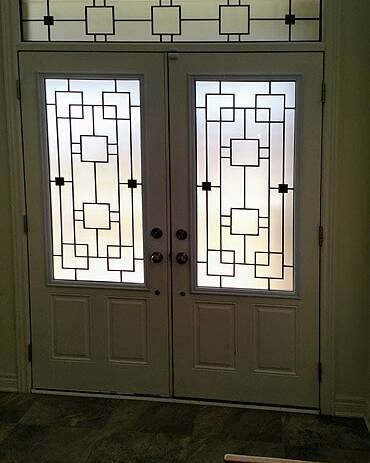Artisan wrought iron door insert, installed (photo 10)