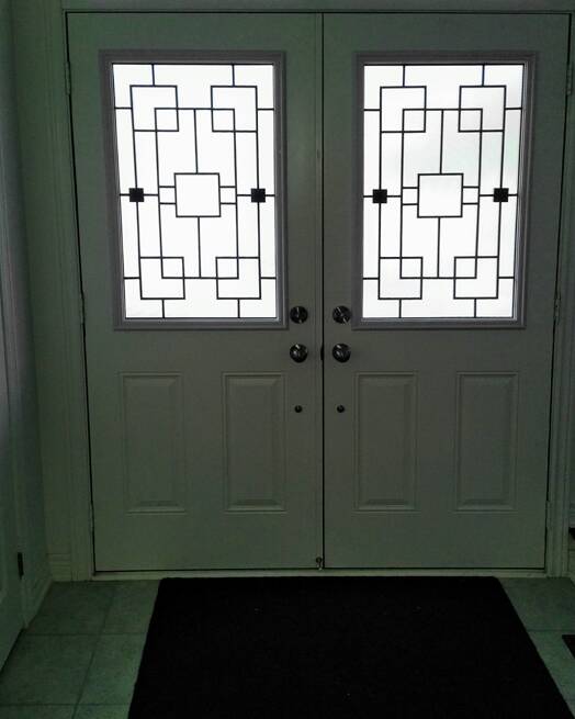 Artisan wrought iron door insert, installed (photo 11)