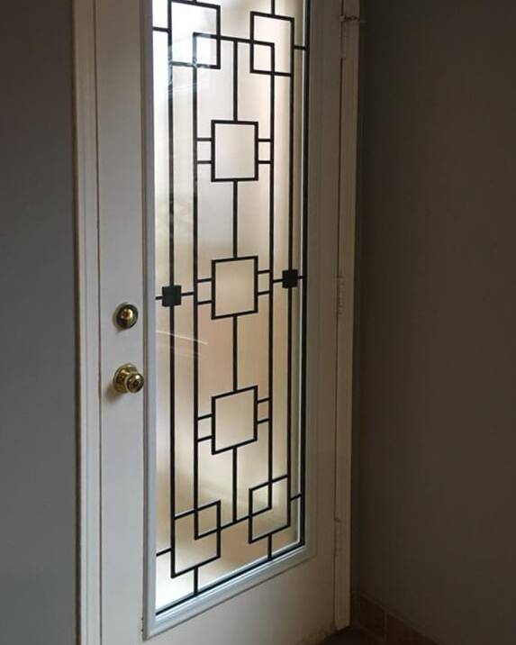 Artisan wrought iron door insert, installed (photo 14)