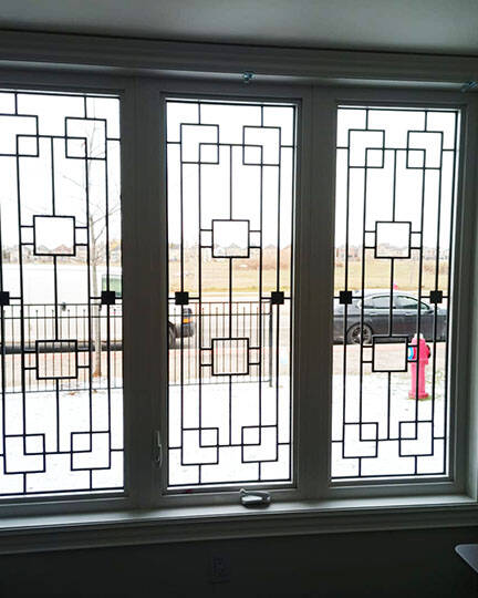 Artisan wrought iron door insert, installed (photo 16)