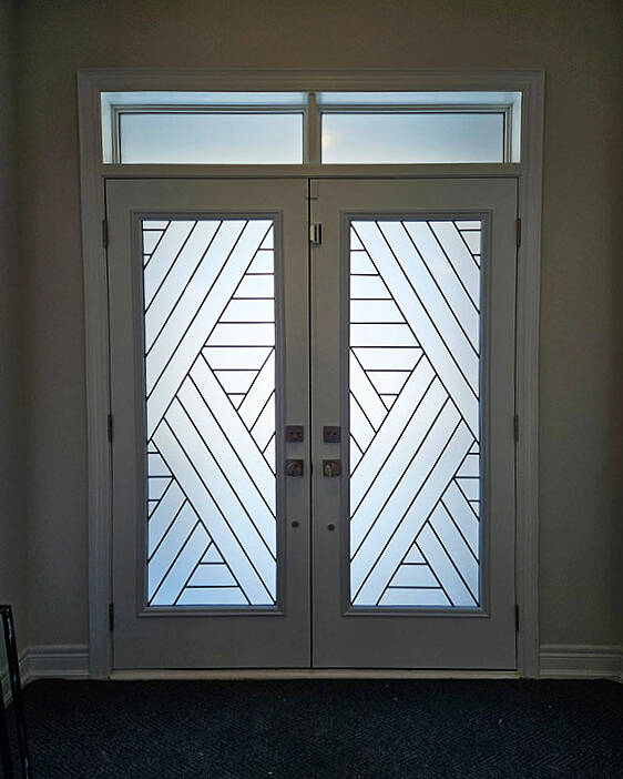 Axis wrought iron door insert, installed (photo 8)