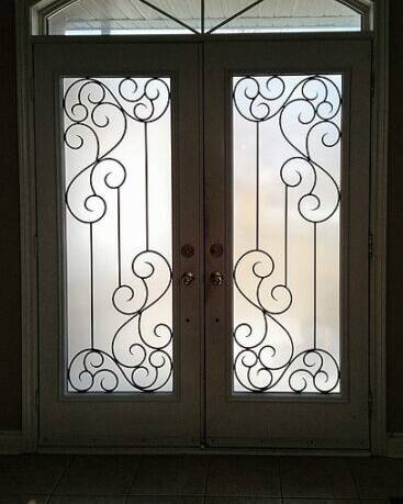 Odyssey wrought iron door insert, installed (photo 4)