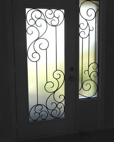 Odyssey wrought iron door insert, installed (photo 5)