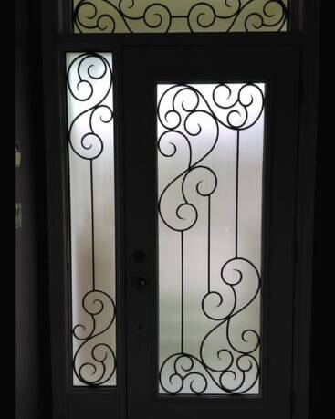 Odyssey wrought iron door insert, installed (photo 6)