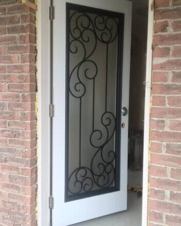 Odyssey wrought iron door insert, installed (photo 8)