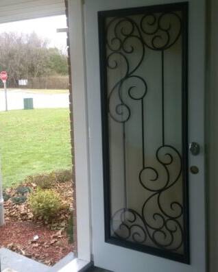 Odyssey wrought iron door insert, installed (photo 9)