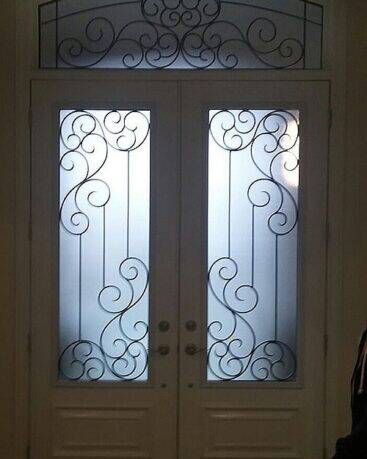 Odyssey wrought iron door insert, installed (photo 10)