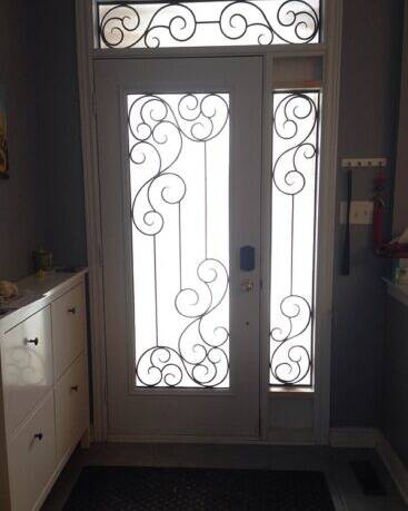 Odyssey wrought iron door insert, installed (photo 11)