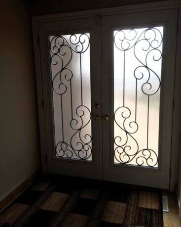 Odyssey wrought iron door insert, installed (photo 13)