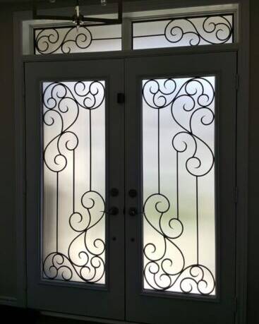 Odyssey wrought iron door insert, installed (photo 14)