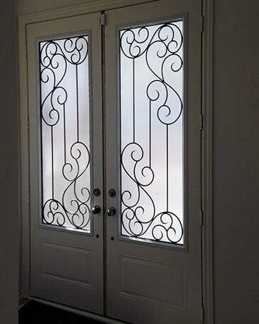 Odyssey wrought iron door insert, installed (photo 15)